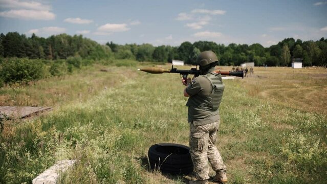 RG-7, Precision Shoulder-Fired Rocket Launcher, PSRL-1, is ready for firing by a serviceman of the Ukrainian army.