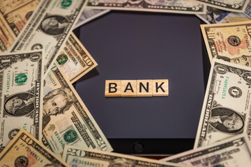 Money, US dollar bills background. Money scattered on the desk. Photography for Finance and Economy concepts.
 World economy crisis, U.S. vs China trade or currency war concept. Interest rates affect 