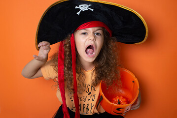 Little girl  wearing pirate costume at Halloween