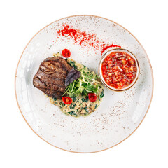 Portion of grilled mignon steak with sauce