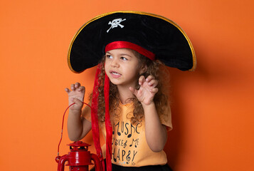 Little girl  wearing pirate costume at Halloween