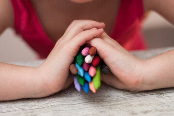 person holding pencils