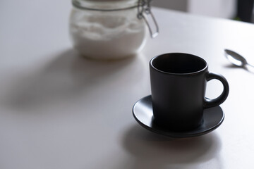 cup of coffee in the morning and sugar bowl background. horizontal image
