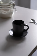 cup of coffee in the morning and sugar bowl background
. vertical image