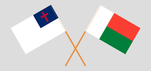 Crossed flags of christianity and Madagascar. Official colors. Correct proportion