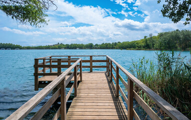 Wooden footbridge with views of Banyoles lake