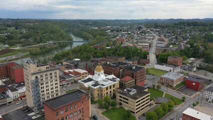 The Marion County courthouse in Fairmont, WV, and the surrounding small town and countryside in the appalachian mountains.