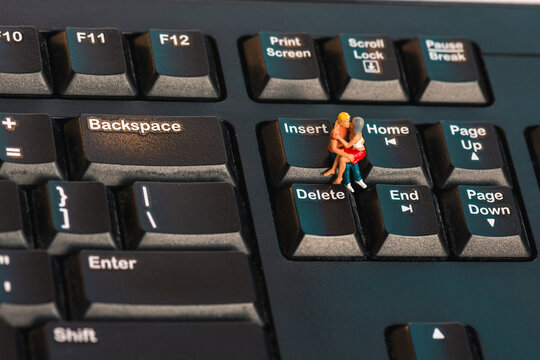 miniature people: fall in love on a keyboard - Powered by Adobe