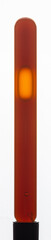 Yellow viscous liquid sunflower lecithin with bubbles in a transparent test tube on a white background
