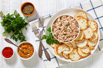 classic ham salad with crackers on white plate