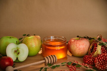 Apples, pomegranate and honey, the traditional food of the Jewish New Year - Rosh Hashana. Copy space background