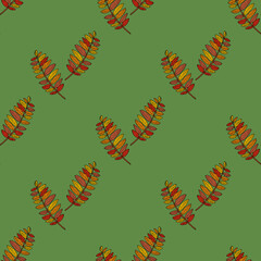 Seamless pattern of autumn rowan leaves on green background. Vector image. Doodle style.