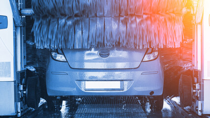 Car wash automatic carwash. Brush washer clean blue auto car on automatic car wash station. Auto...