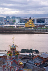 Orthodox churches with beautiful domes at the first evening lights in autumn in Nizhny Novgorod - 529487357