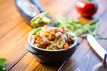 eggplant fried sauteed with other vegetables in a plate
