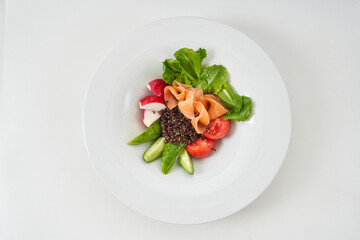 appetizer with red fish and vegetables