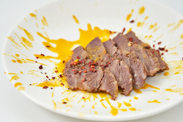juicy beef in creamy sauce