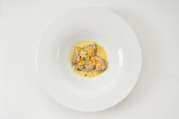 pork slices with sour cream sauce with vegetables