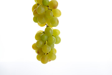 bunch of white grapes on white background. Copy space