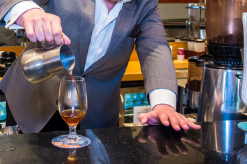 Coffee day shot and coffee maker, Photo is selective focus with shallow depth of field. Taken at Cairo Egypt on 28 September 2017.