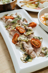 Sun-dried tomato, chicken breast with vegetables and mushrooms.