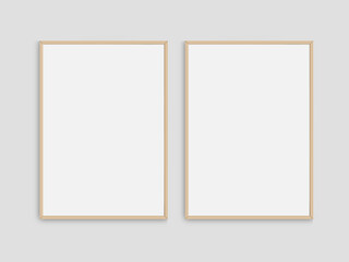 Set of 2 realistic photo frames mockup. Portrait large a3, a4 wooden frame mockup on white blank wall. Simple, clean, modern, minimal poster frame. White picture frame mockup. International paper size