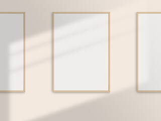 Realistic photo frames mockup. Portrait large a3, a4 wooden frame mockup on the wall with light...