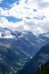 Fototapeta premium Alpine landscape, a famous valley in Switzerland. Lauterbrunnen valley 72 waterfalls, the place that was inspired by Tolkien