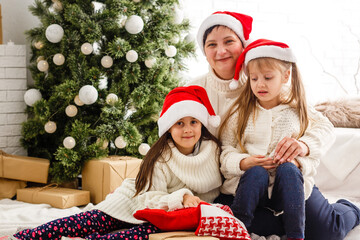 Two little girls in Christmas background