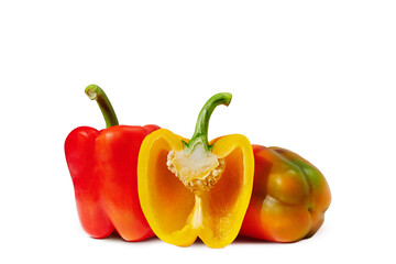 Yellow, red, green pepper on white background