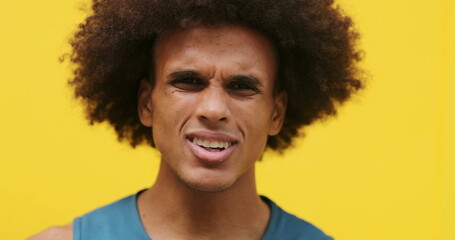 African american man disgust face complaining
