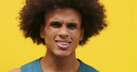 African american man disgust face complaining