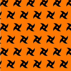 Shuriken icon in modern style isolated on orange background. © NOTE OMG