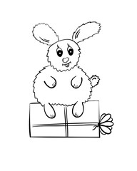 Cute white easter rabbit. Funny easter Bunny. Rabbit sitting on a christmas present. Symbol of the new year 2023.