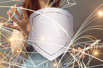 shield protection concept holding in hand