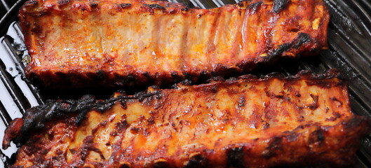 delicious spare ribs on the grill