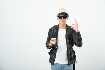 Traveler tourist happy man show okay ok gesture isolated on white background. journey concept
