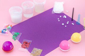 layout pink slime, yellow slime on a pink background on a purple background ingredients for slime