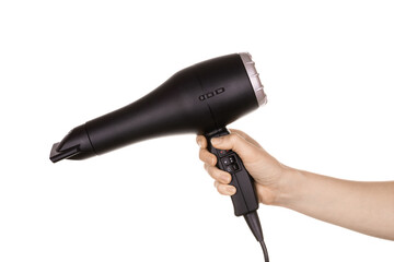 A woman's hand holds a professional hair dryer in black. Tools for the hairdresser. The concept of providing hairdressing services, delicate hair care. Isolated on white background