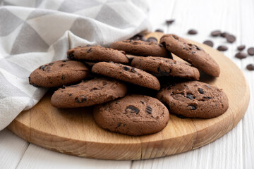 Morning breakfast of chocolate chip cookies on wooden board. Recipe of wheat cookies with chocolate chips.