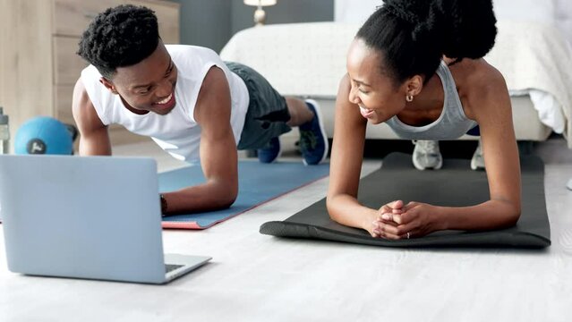 Couple exercise, fitness or training with laptop on the floor in bedroom together. Happy black man and woman high five, goal and celebration for target or support in sport workout success at home