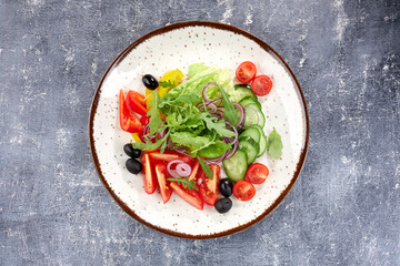 fresh salad on the dark background