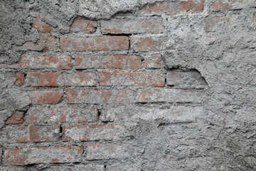 Brick wall with cracked cement surface, empty wall and no person, 