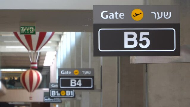 Airport gate sign in row