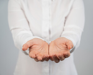 Close-up of female hands with palms up. 