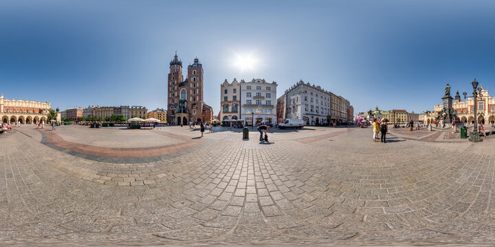 full 360 hdri panorama on main market square in center of old town with historical buildings, temples and town hall with a lot of tourists in equirectangular projection