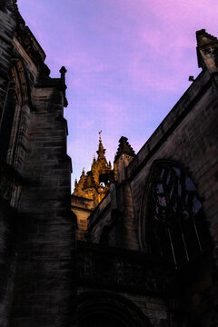 Dramatic and inspiring sunlight on the medieval steeple of St. Giles Cathedral Royal Mile at sunrise.