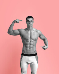 Fototapeta premium Fitness expert. Think with your head about your body. You are what you eat. Personal trainer and motivator. Muscular man athlete with glasses. Black and white