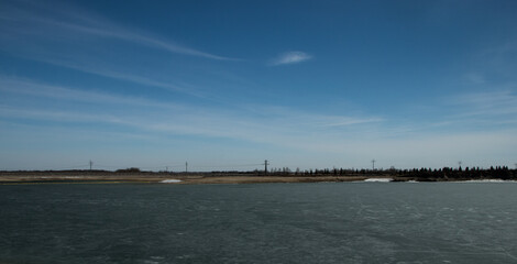 An early warm spring day. Dickson Dam, Red Deer County, Alberta, Canada