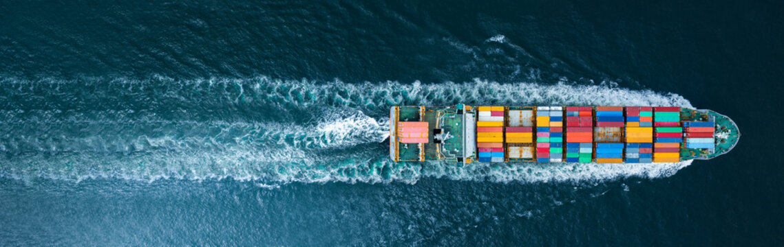 cargo container ship top view carrying container and running for export  goods  from  cargo yard port to other ocean concept freight shipping ship logistics transportation business service concept